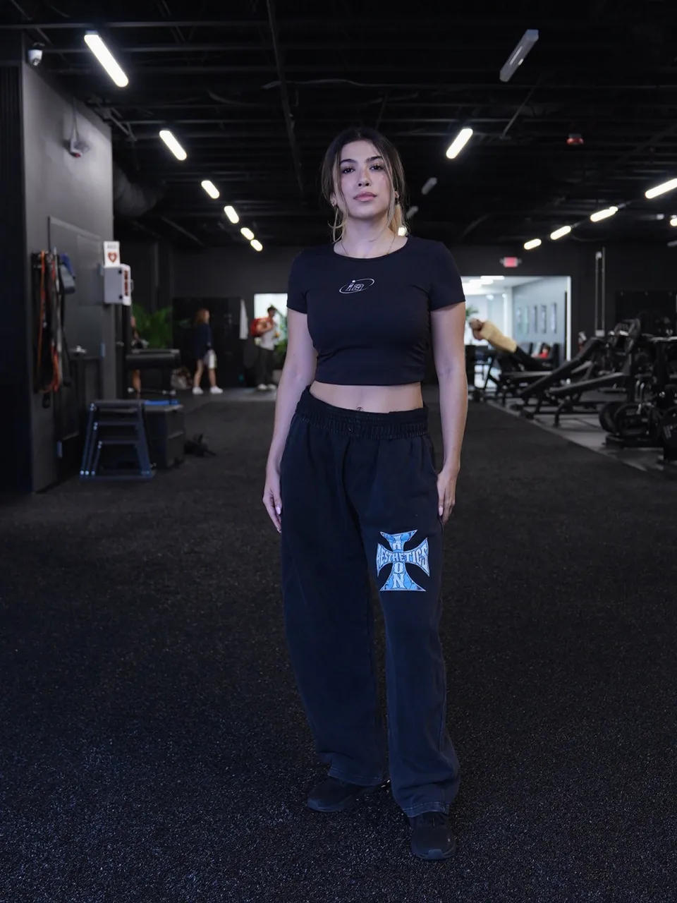The Blue Cross Sweatpants in navy, the cross on the thigh