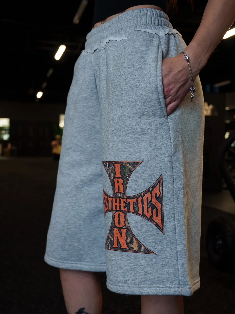 Raw Edge Fleece Shorts in Flower Gray, worn in the gym